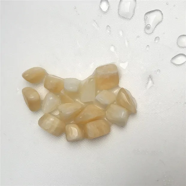 Calcite (orange) tumbled stones, 1.0 - 2.0 cm (S) | Marco Schreier