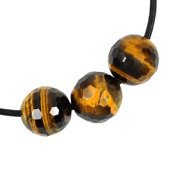 Drilled faceted Tiger's Eye sphere, 16mm, 2.5mm drill hole | Marco Schreier