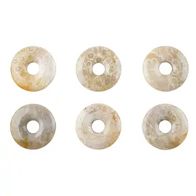 Petrified Coral donut, 30mm | Schreier wholesale; gems, healing stones & jewelry