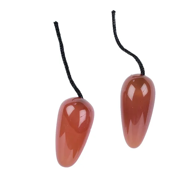 Ear olives carnelian (heated), with info sheet, in pouch | Marco Schreier