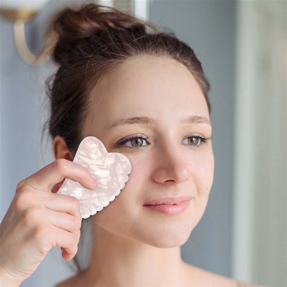 Gua Sha Rose Quartz with teeth | wholesaler gems, healing stones & jewelry