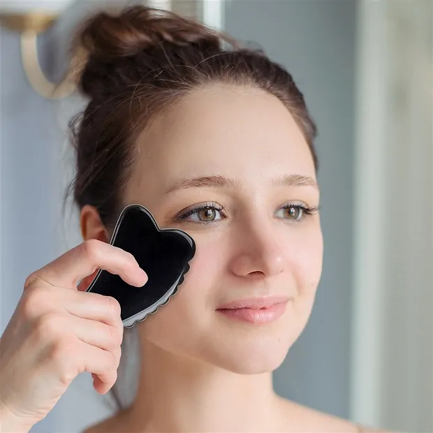 Gua Sha Obsidian with teeth | wholesale supplier gems, healing stones & jewelry