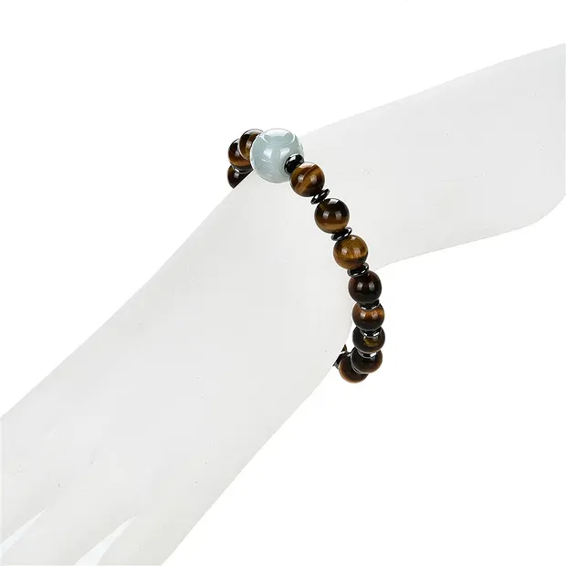 Bracelet, Tiger's Eye with jade ball and hematin rings | Marco Schreier