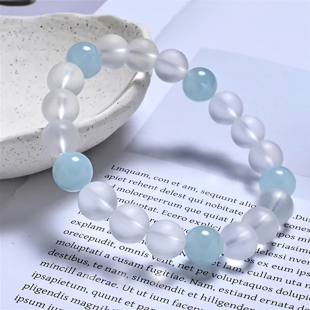 Pulsera, Cristal de roca, Aguamarina, cuentas de 10mm | Marco Schreier