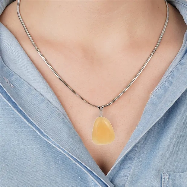 Pendentif Calcite (orange), Pierre roulée grande, rhodié | Marco Schreier