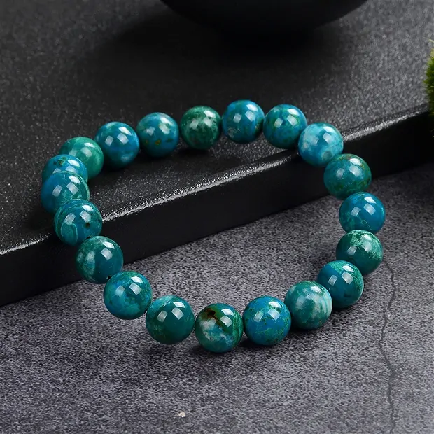 Bracelet, chrysocolla (stab.), 10mm beads, 21cm | gems, healing stones & jewelry