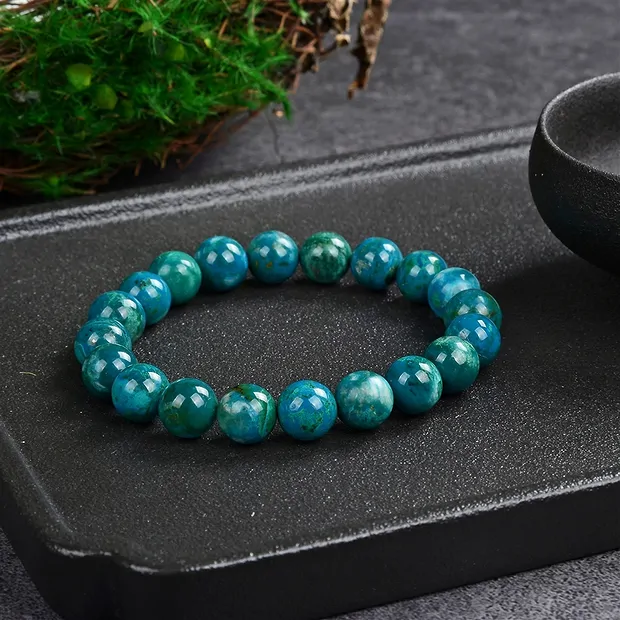 Pulsera, crisocola (estabilizado), cuentas de 10mm, 21cm | Marco Schreier