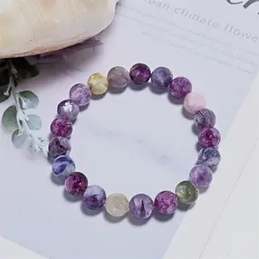Bracelet, Lepidolite/Biotite, 10 - 11mm spheres | gems, healing stones & jewelry