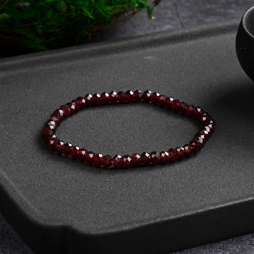 Pulsera, granate, 03 x 05mm botones, facetado | Marco Schreier