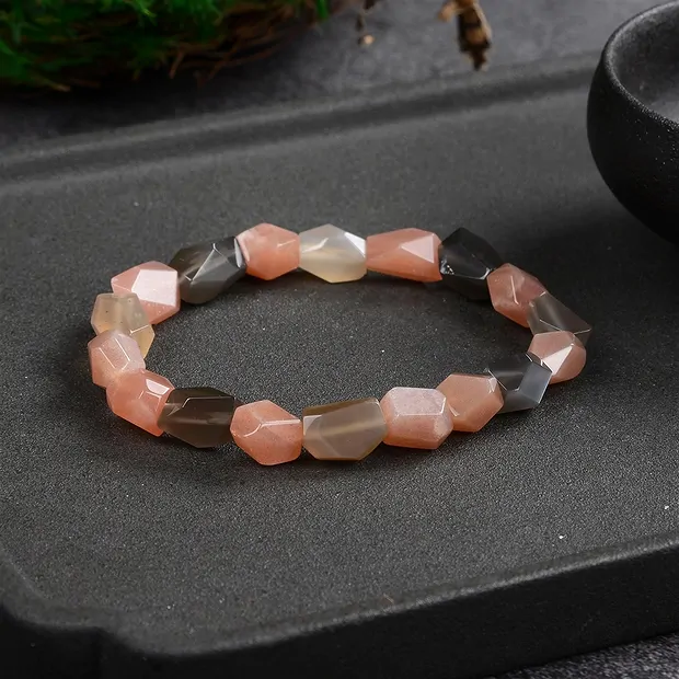 Bracelet, Moonstone (multicolored), 08 x 10mm nuggets, faceted | Marco Schreier