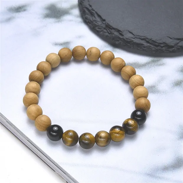 Bracelet, Tiger's Eye, Tourmaline (black), sandalwood, 8mm, 17cm | Marco Schreier