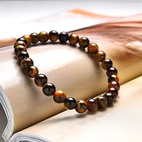 Pulsera, Ojo de tigre (Oro), cuentas de 06mm, 15cm (para niños) | Marco Schreier