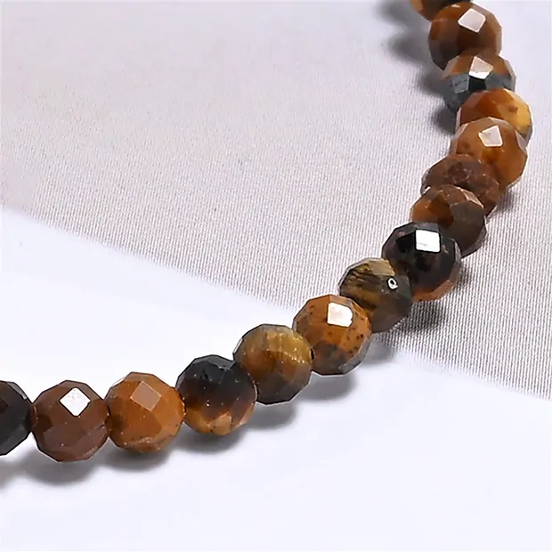 Armband, Tigerauge (gold), 03mm Kugeln, facettiert, 19cm | Marco Schreier