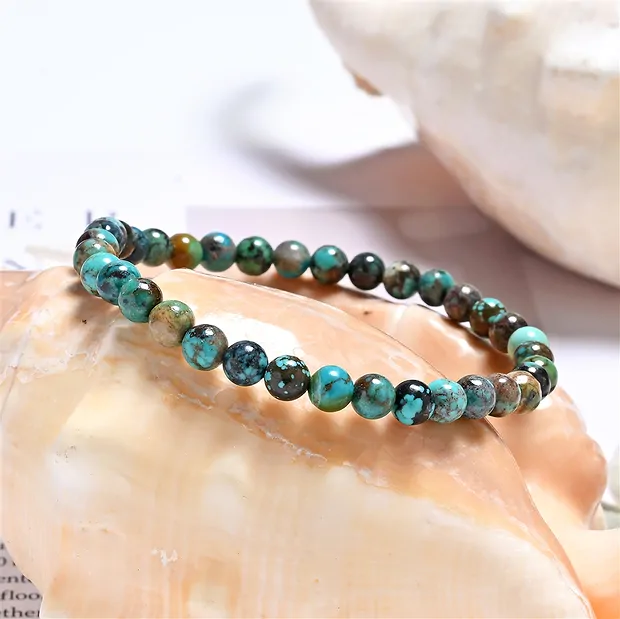 Bracelet, Turquoise (stab.), 06mm beads | wholesaler gems & healing stones
