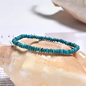 Bracelet, Turquoise (stab.), 02 x 04mm Boutons, facettés | Marco Schreier