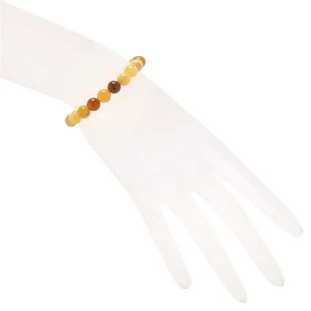 Bracelet, opal (honey opal), 07.5 - 08.0mm spheres | Marco Schreier