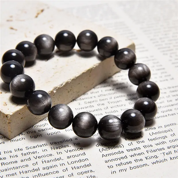 Bracelet, Obsidian (silver luster obsidian), 10mm beads | Marco Schreier