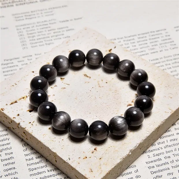 Pulsera, Obsidiana (obsidiana de reflejo plateado), cuentas de 10 mm | Marco Schreier