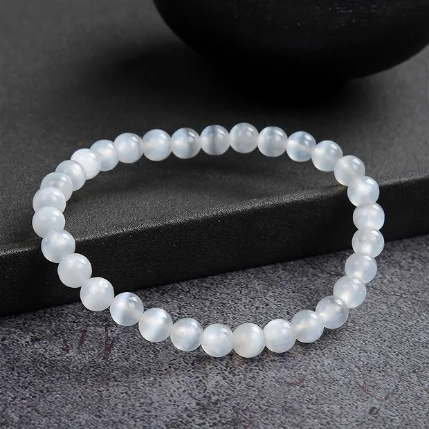Bracelet, selenite, 06mm beads | minerals trade - gems, healing stones & jewelry