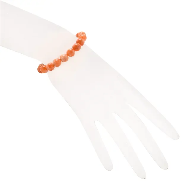Bracelet, calcite (orange-red), 08mm beads | wholesaler gems & healing stones