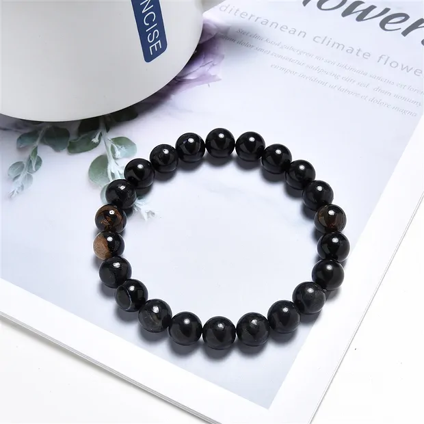 Pulsera, Madera petrificada (negra), cuentas de 10mm, 21cm | Marco Schreier
