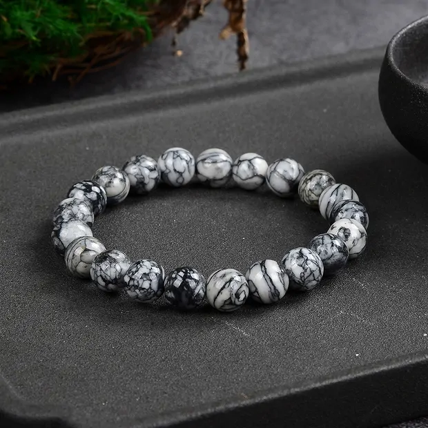 Bracelet, Pinolite (magnésite fleur de glace), 08 - 09mm boules | Marco Schreier