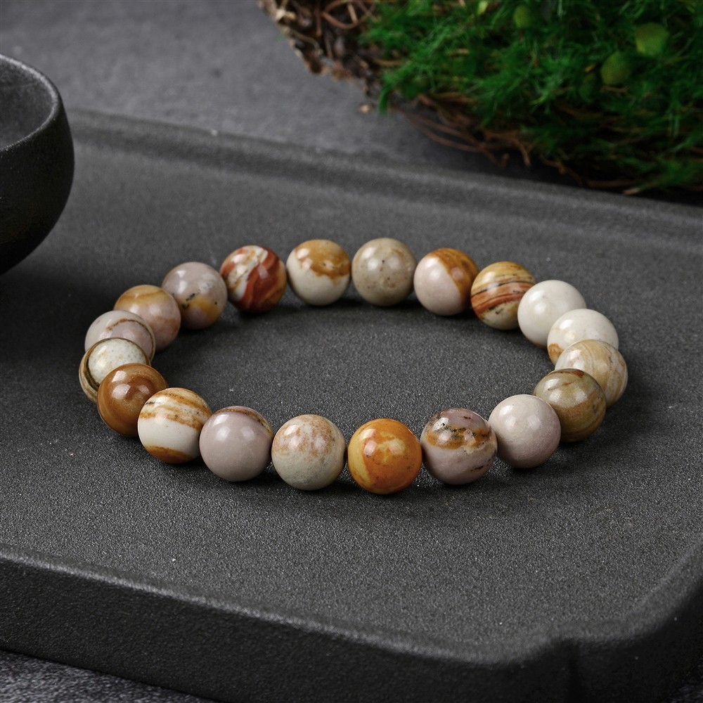 Pulsera, riolita roja nocturna, cuentas de 10 mm, 21 cm | Marco Schreier