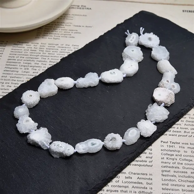 Strand of slices, Agate (white) (Druzy Flower),16 - 22mm | Marco Schreier