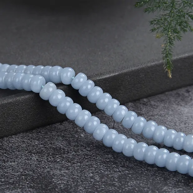 Rang de colliers Boutons, Anhydrite (Angélite), 03 x 06 mm | Marco Schreier