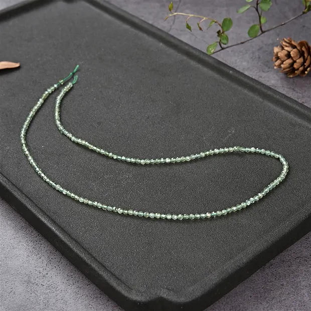 Strang Kugeln, Apatit grün (stab.), facettiert, 02,5mm (39cm) | Marco Schreier