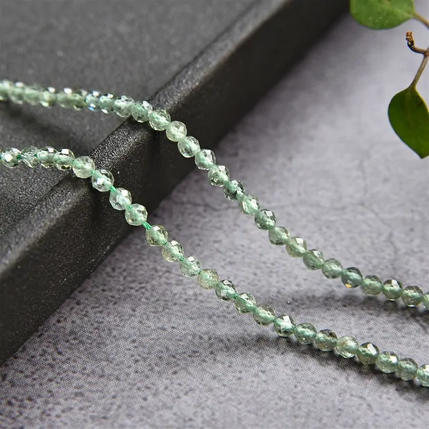 String Beads, Apatite (green) (stab.), faceted, 02,5mm (39cm) | Marco Schreier
