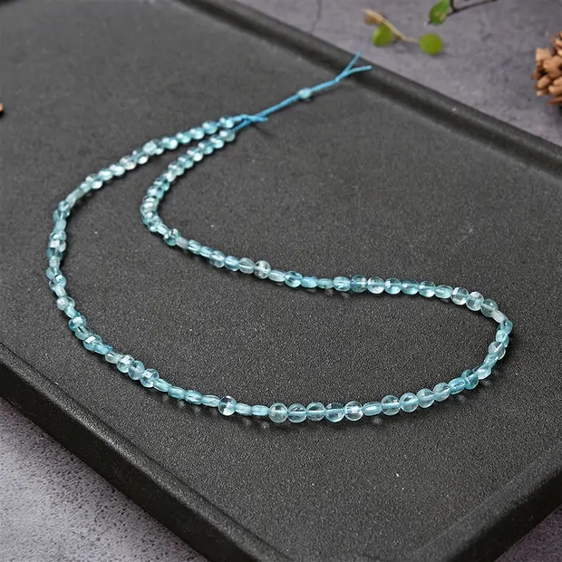 Strand disc/coin, apatite (stab.), faceted, 04mm (38cm) | Marco Schreier