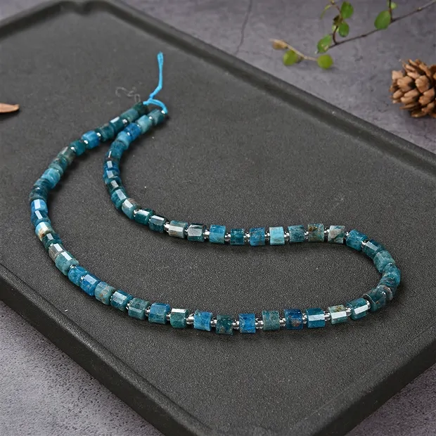 Strang Zylinder, Apatit (stab.), facettiert, 05-06 x 05mm (39cm) | Marco Schreier