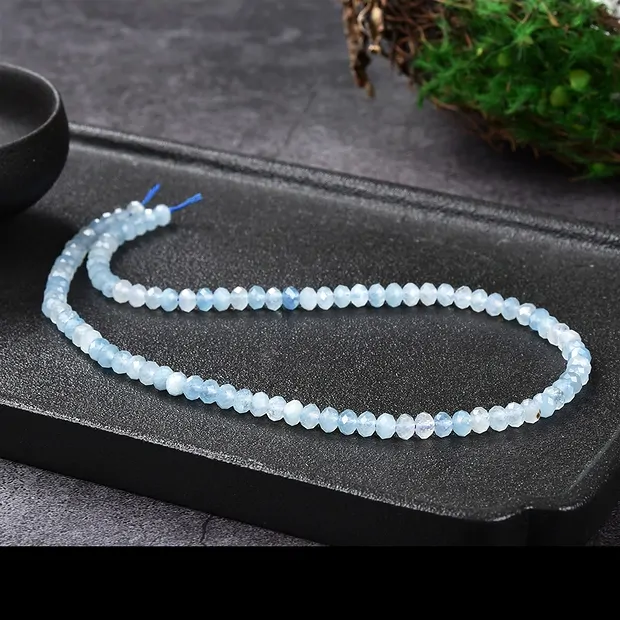 Strand button/disc, Aquamarine, faceted, 05.5mm (39cm) | Marco Schreier