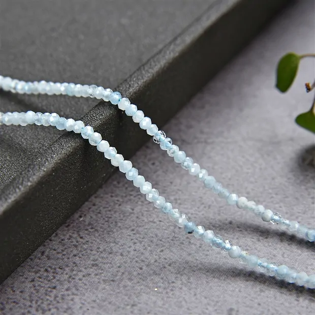 Collar de botones, Aguamarina, facetado, 01.5 x 02mm | Marco Schreier