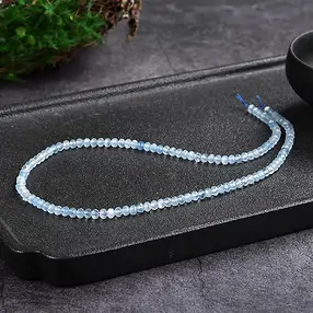 Strang Button/Laterne, Aquamarin A, 03 x 04mm, facettiert | Marco Schreier