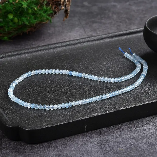 Strand button/lantern, Aquamarine A, 03 x 04mm, faceted | Marco Schreier