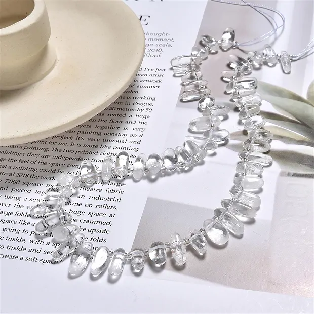 Rang de colliers Nugget "dent", Cristal de roche, 10-20mm (39cm) | Marco Schreier