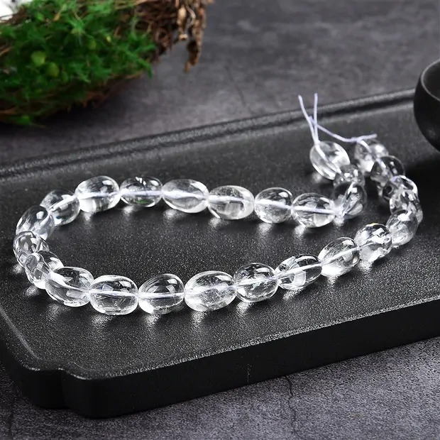 Tiras de pepitas, Cristal de roca, 13-19 x 13-16mm (39cm) | Marco Schreier