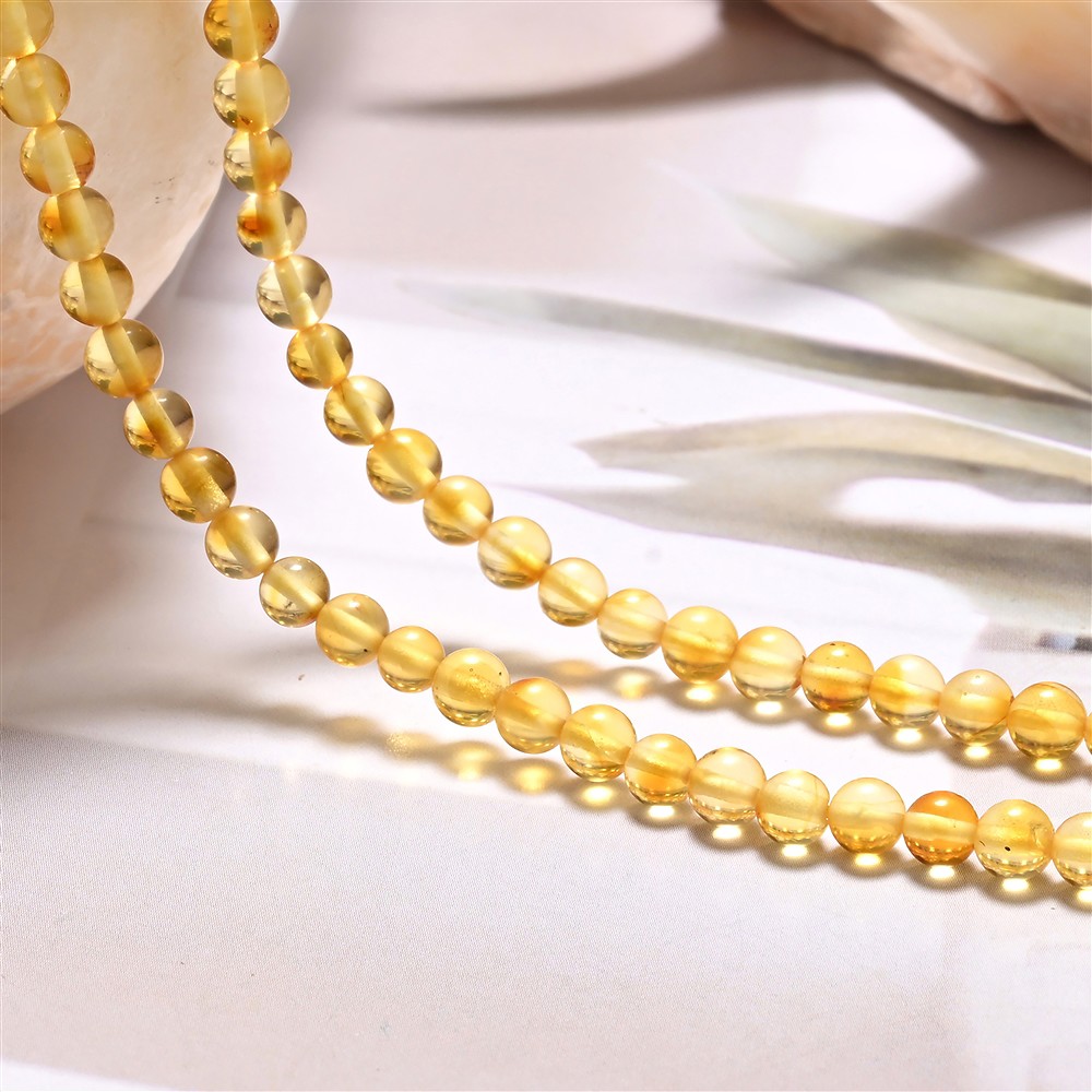 Strang Kugel, Bernstein, 04mm | Großhändler Edelsteine, Heilsteine & Schmuck