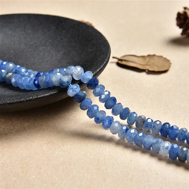 Filo di bottoni, quarzo blu, sfaccettato, 03 x 05 mm (38 cm) | Marco Schreier