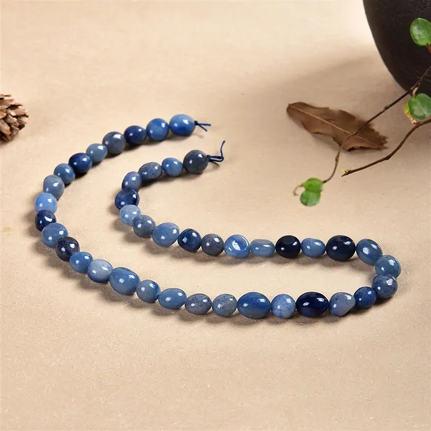 Strand of nuggets, blue quartz, 08-12 x 10-12mm | gems, healing stones & jewelry