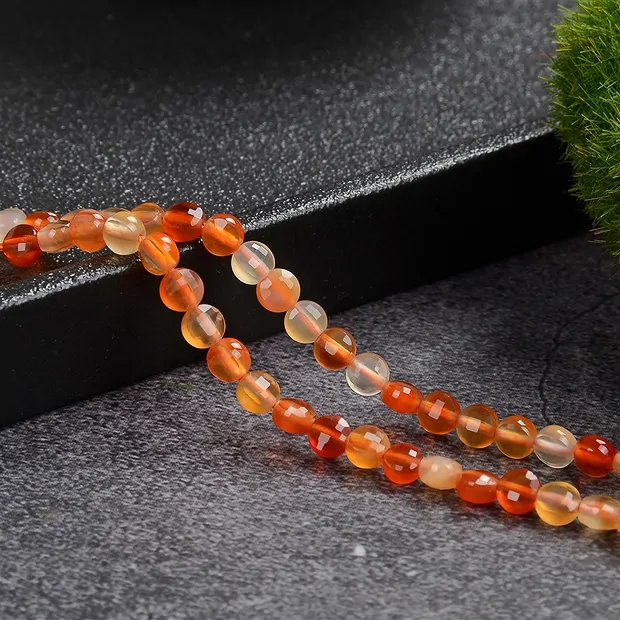 Strand Coin, Carnelian (heated), faceted, 04 x 02mm (39cm) | Marco Schreier