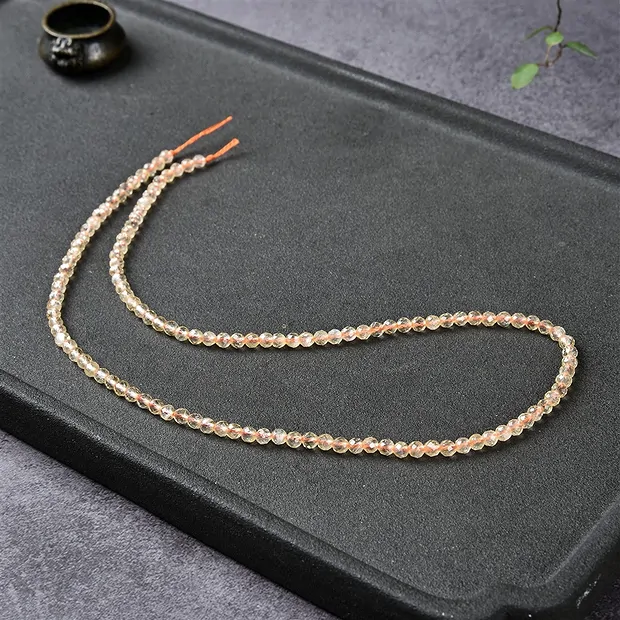 Rang de collier boules, citrine (chauffée), à facettes, 03mm (39cm) | Marco Schreier