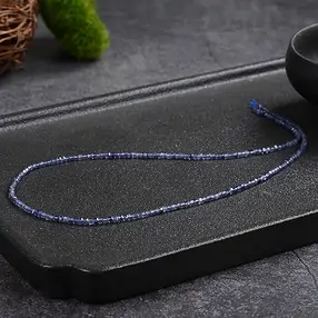 Stringed beads cube, iolite, 02mm, faceted (39cm) | Marco Schreier