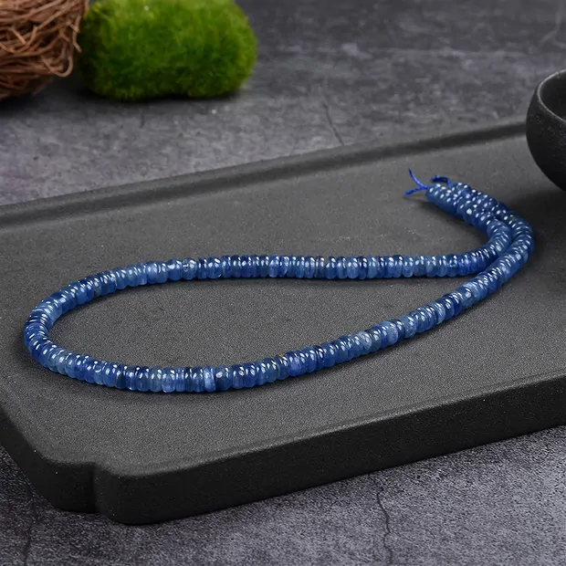 Rang de colliers Boutons, Disthène (stab.) AA, 04 x 06mm | Marco Schreier