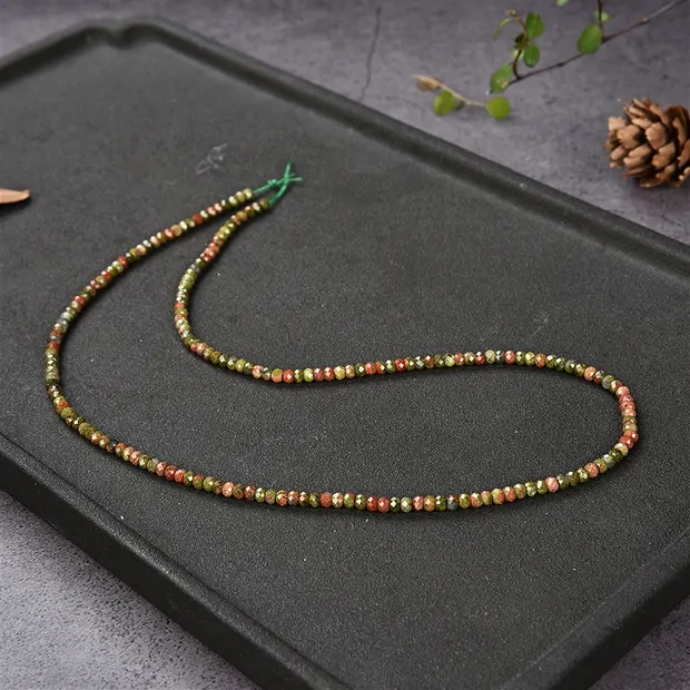 Rang de colliers Boutons, Unakite, facetté, 02 x 03mm | Marco Schreier