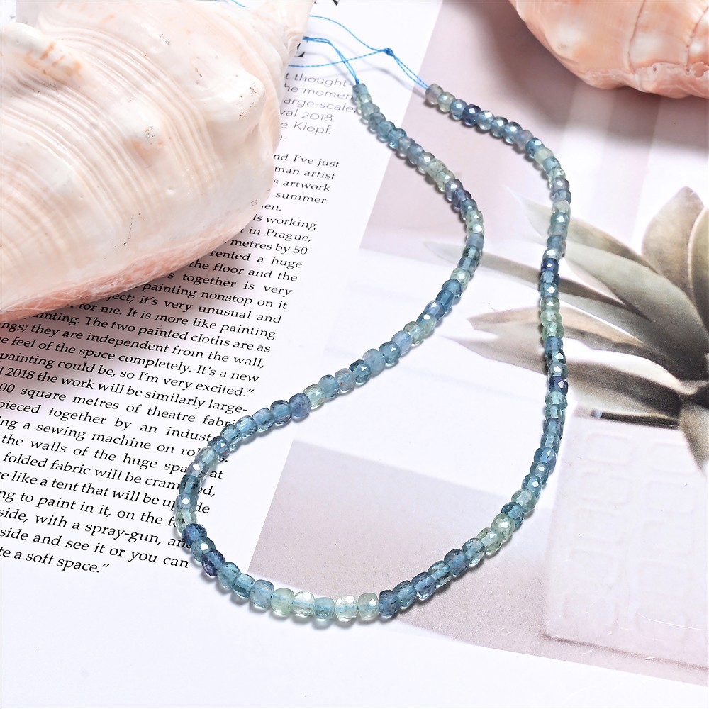 Strand of cubes, fluorite (blue-green), 0.4 mm faceted (39 cm) | Marco Schreier