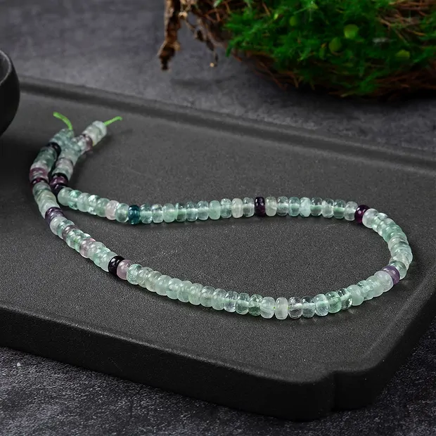 Filo di bottoni, fluorite, 04 x 06 mm | grossista gemme e pietre curative