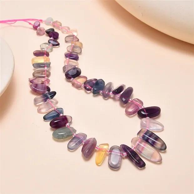 Strand of nuggets "tooth", fluorite, 03-05 x 10-19mm | Marco Schreier